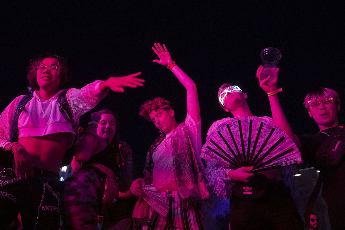 Fan's dance as the beat drops during Pluko's set at the Lost in Dreams music festival at the Do ...