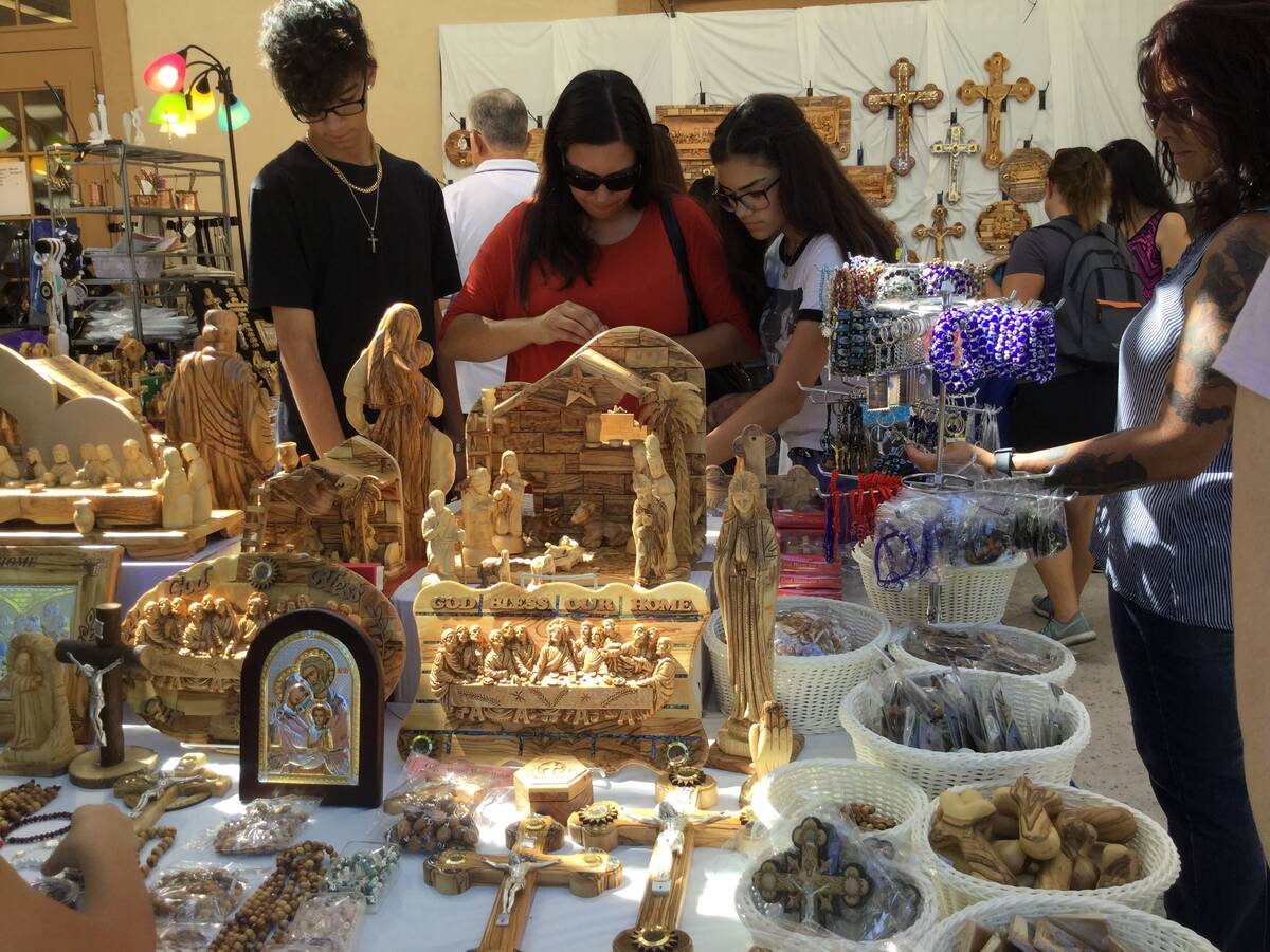 People shop during the 45th annual Greek Food Fest in Las Vegas, Sunday, Sept. 17, 2017. (Las V ...