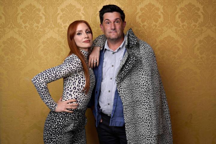Jessica Chastain, left, the star of "The Eyes of Tammy Faye," poses for a portrait with directo ...