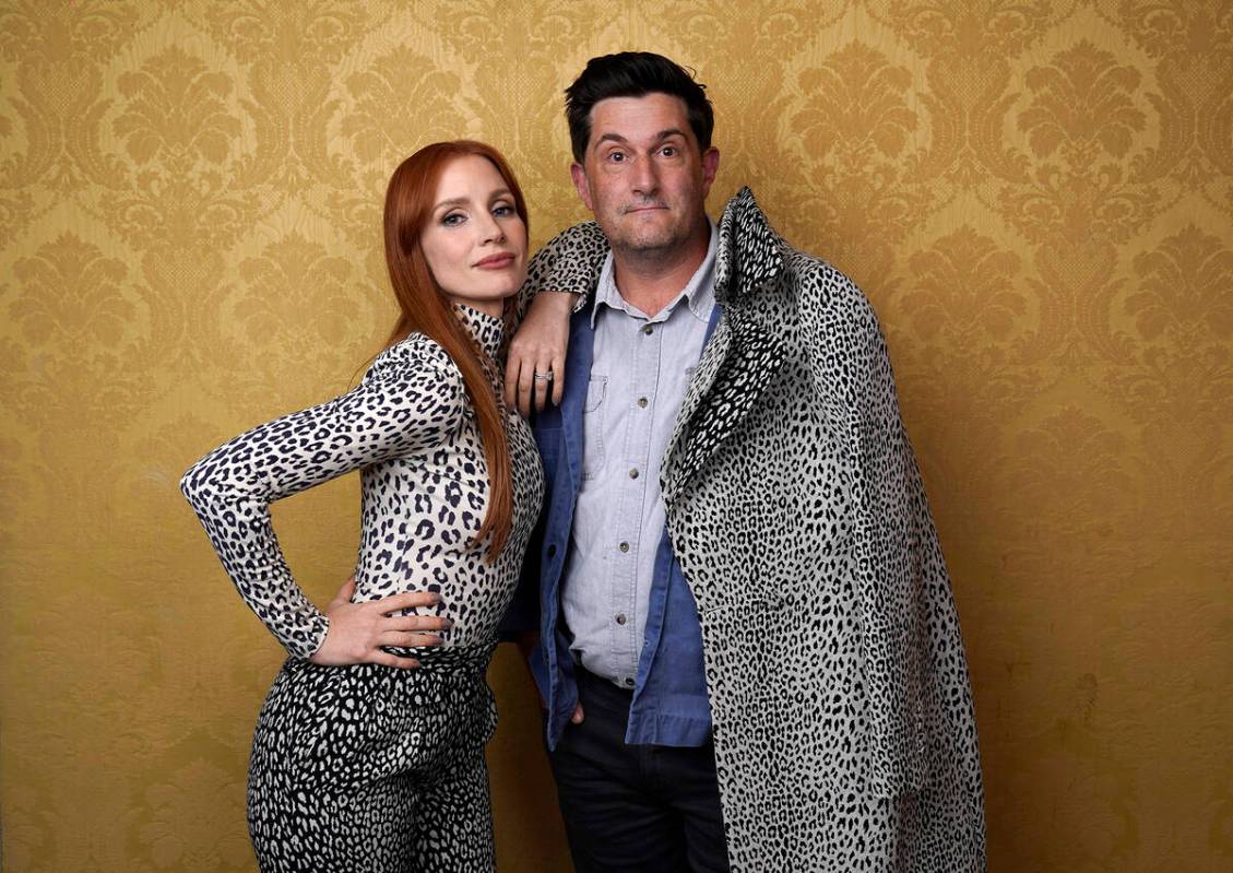 Jessica Chastain, left, the star of "The Eyes of Tammy Faye," poses for a portrait with directo ...