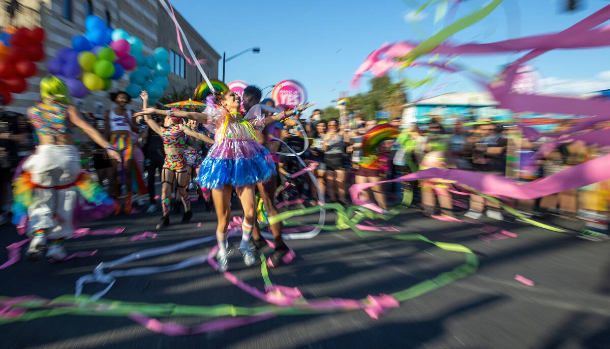 Dancers with The House of Yes perform during a Gay Pride parade on Fremont Street during day tw ...