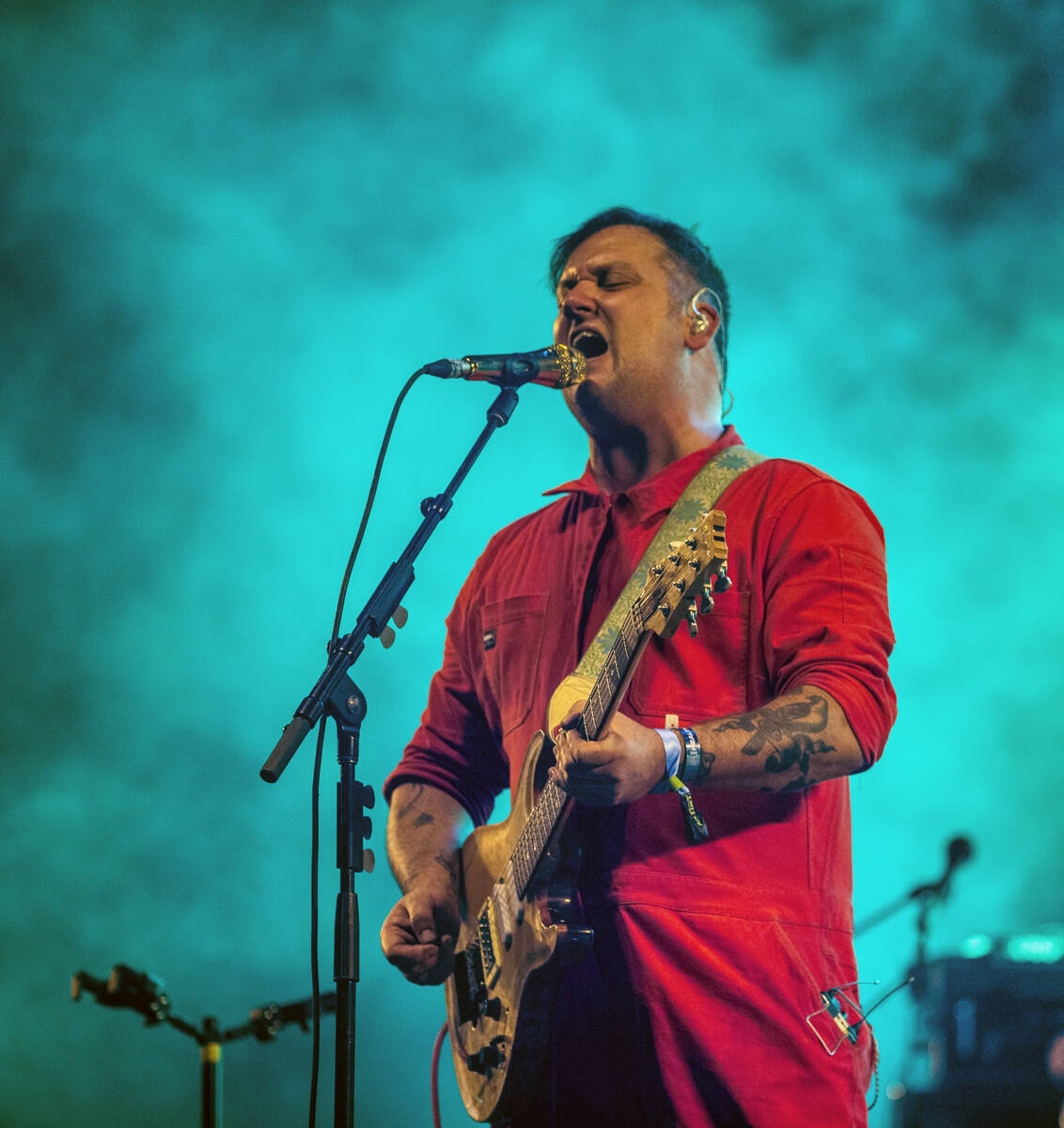 Modest Mouse lead singer Isaac Brock performs with the band on the Downtown Stage during day tw ...