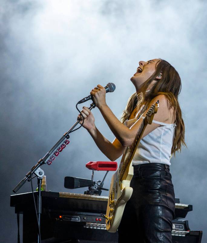 Danielle Haim sings as family band HAIM performs on the Downtown Stage during day two of Life i ...