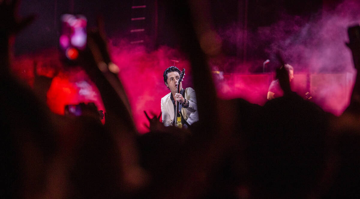 Green Day lead singer Billie Joe Armstrong performs on the Downtown Stage during day two of Lif ...