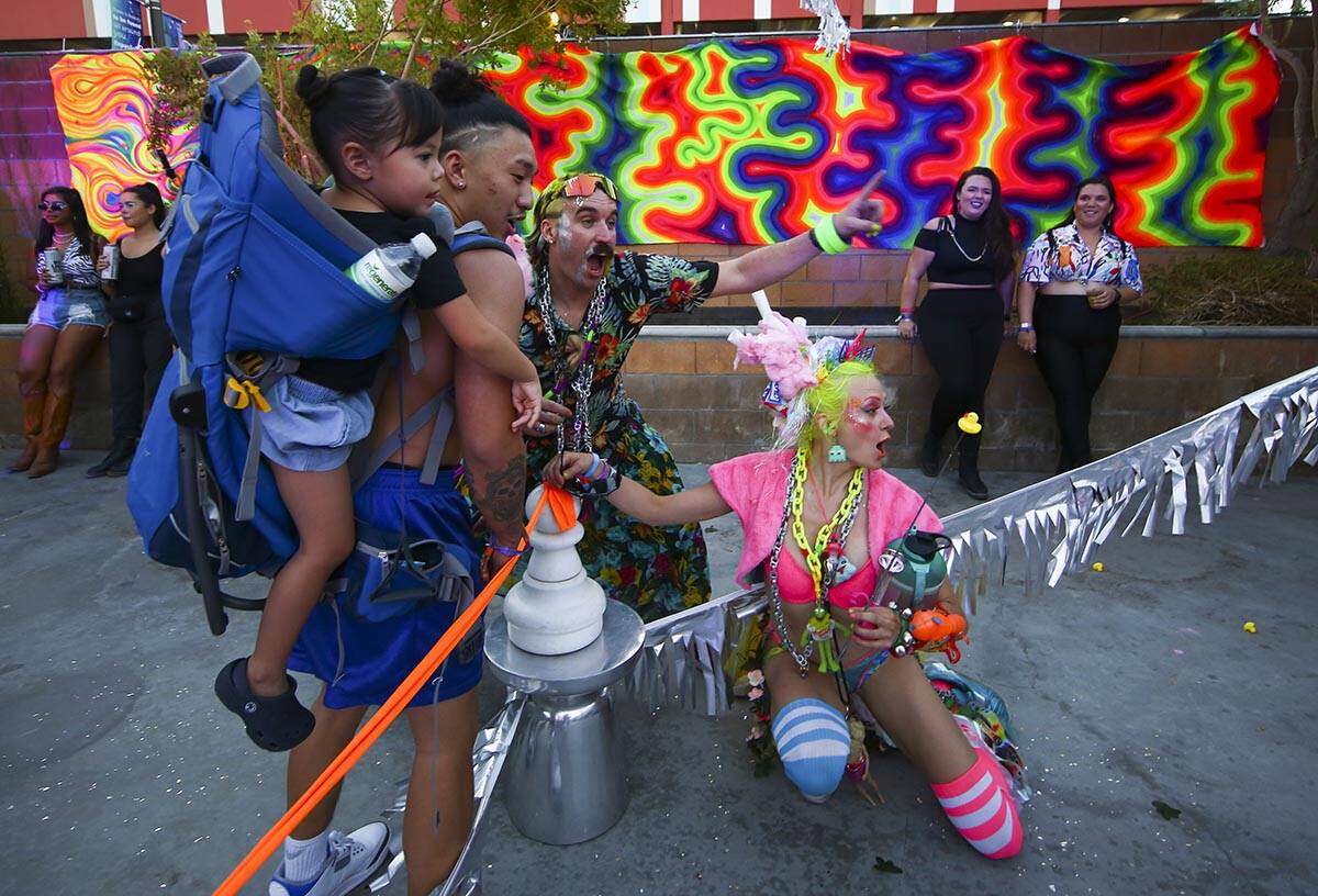 Rawb Lane ÒLazer,Ó center, and Laura Lee ÒPantz,Ó right, performers with Ho ...
