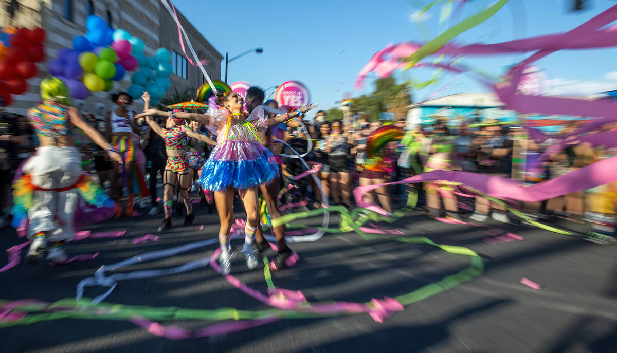 Dancers with The House of Yes perform during a Gay Pride parade on Fremont Street during day tw ...