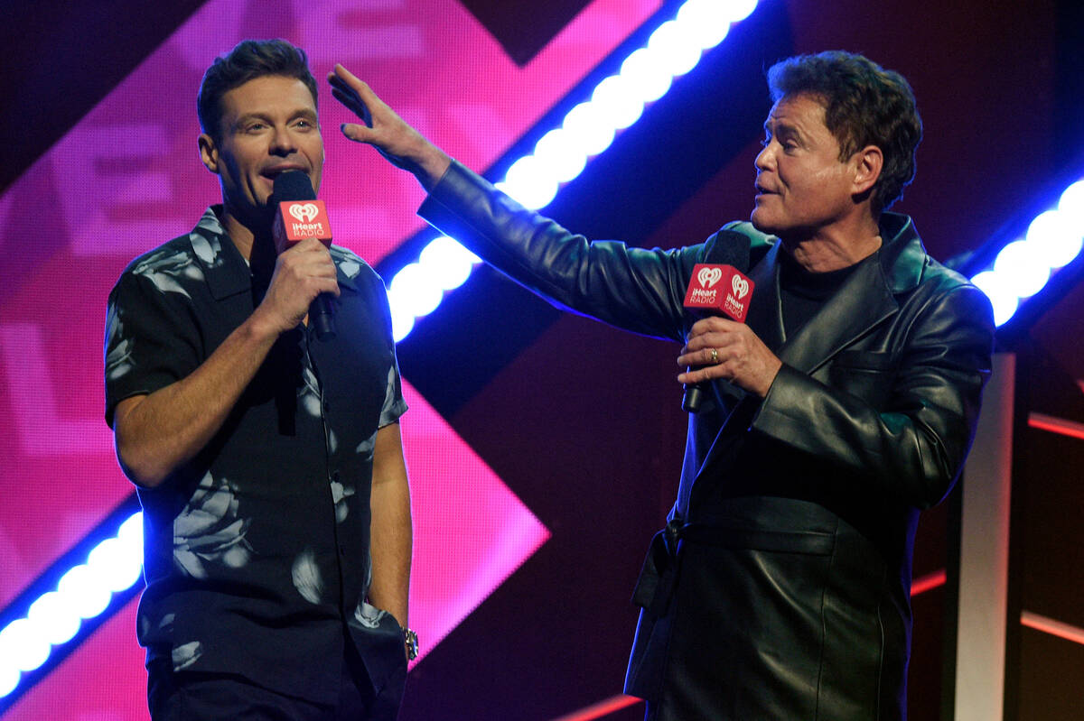 LAS VEGAS, NEVADA - SEPTEMBER 17: (L-R) Ryan Seacrest and Donny Osmond speak onstage during the ...