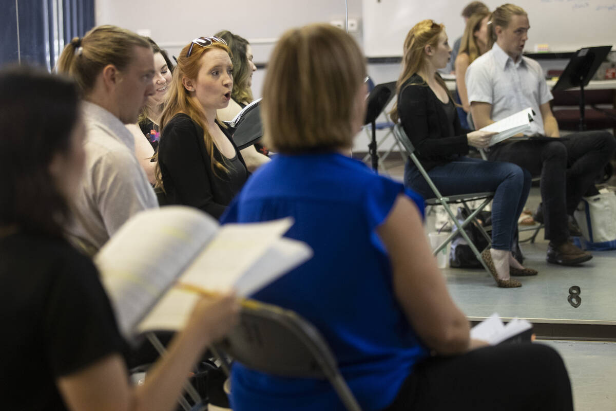 Kayla Wilkens, center, sings during an opera rehearsal of "The Ghosts of Gatsby" at t ...