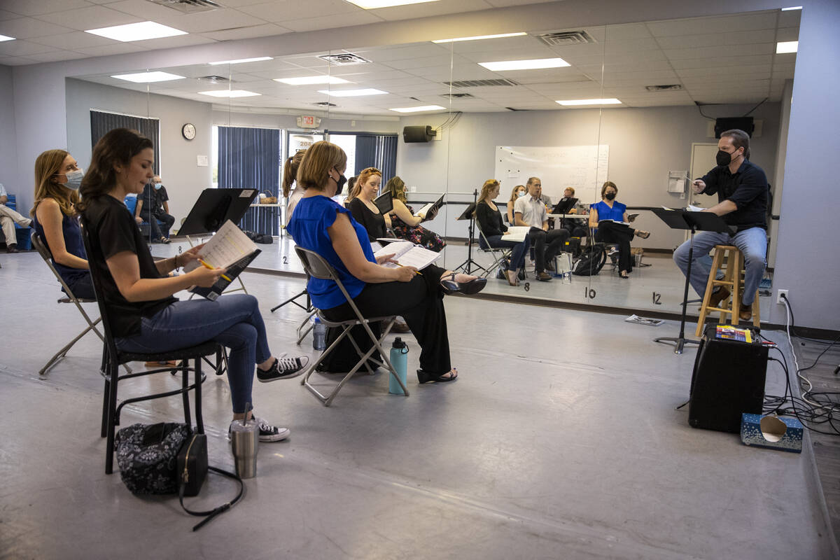 Conductor Joshua Horsch, right, leads an opera rehearsal of "The Ghosts of Gatsby" at ...