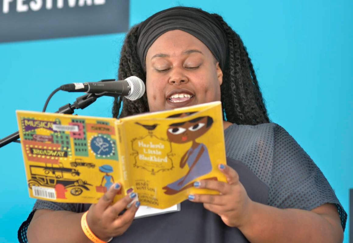 Author Renée Watson reads from her book “Harlem’s Little Blackbird” during the Las Vegas ...