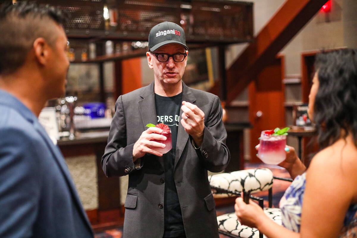Oscar-winning director Steven Soderbergh talks with a local bartender while promoting the liquo ...