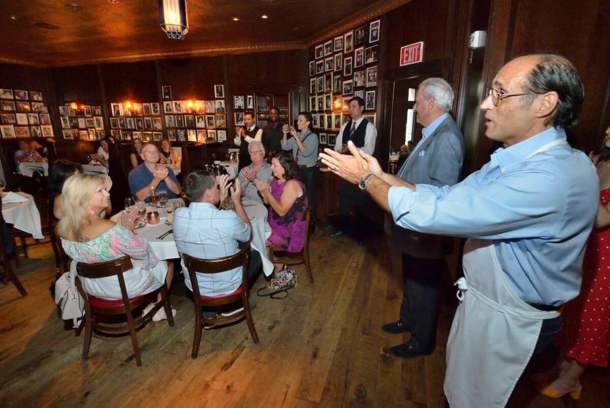 Frank Pellegrino Jr., a partner a Rao’s, left, welcomes guests to his restaurant during Vegas ...