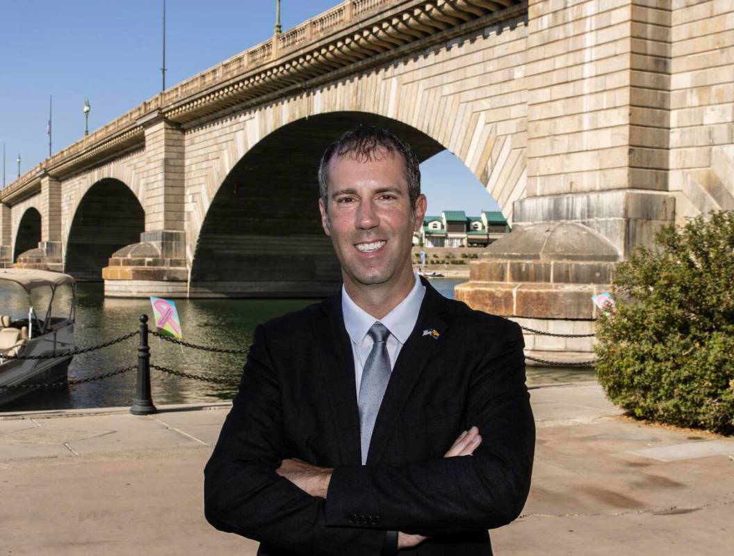 Lake Havasu City Mayor Cal Sheehy poses for a photo standing next to London Bridge on Sunday, O ...