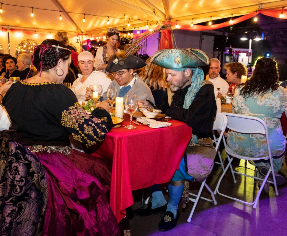 Attendees enjoy their meal during Royal Jubilee Celebration for the 50th anniversary of the Lon ...