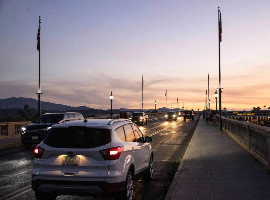 Commuters cross London Bridge on Saturday, Oct. 2, 2021, in Lake Havasu, Ariz. (Bizuayehu Tesfa ...