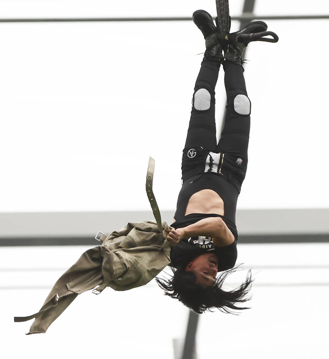Magician and "Mindfreak" star Criss Angel, dangling over 100 feet in the air in Alleg ...