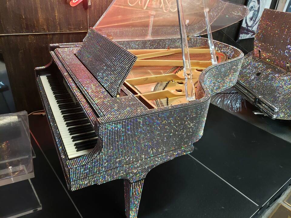 A look at Liberace's 7-foot Baldwin, covered in 80,000 crystals, which was built especially for ...