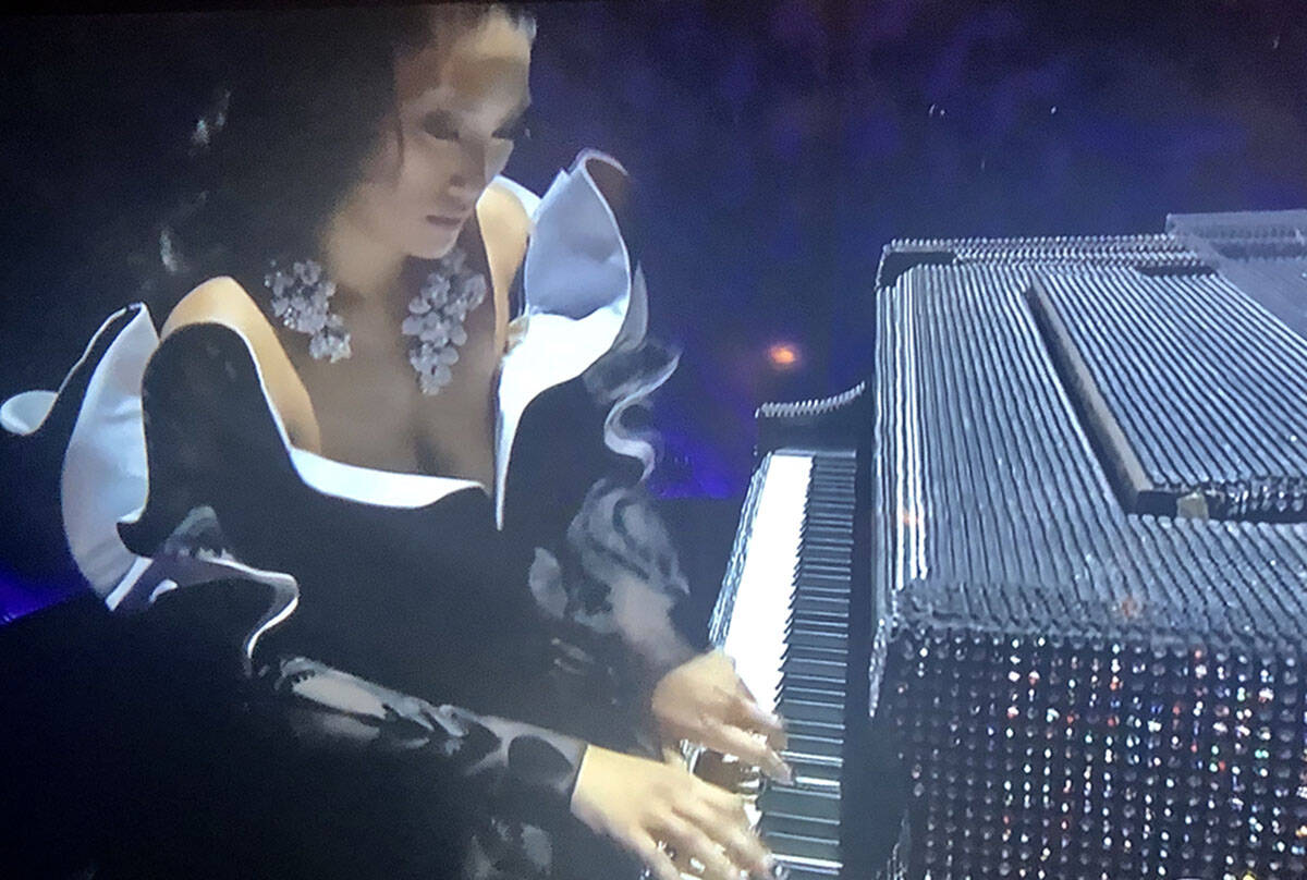 Chloe Flower plays Liberace's rhinestone Baldwin during CBS's Grammy Awards telecast on Sunday, ...