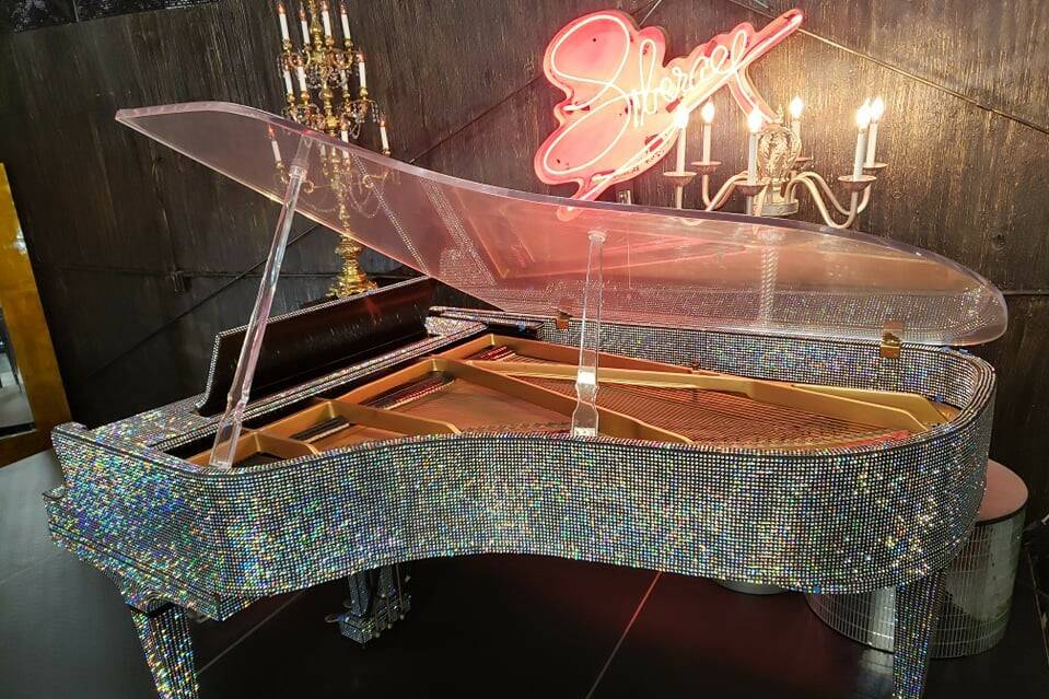 A look at Liberace's 7-foot Baldwin, covered in 80,000 crystals, which was built especially for ...
