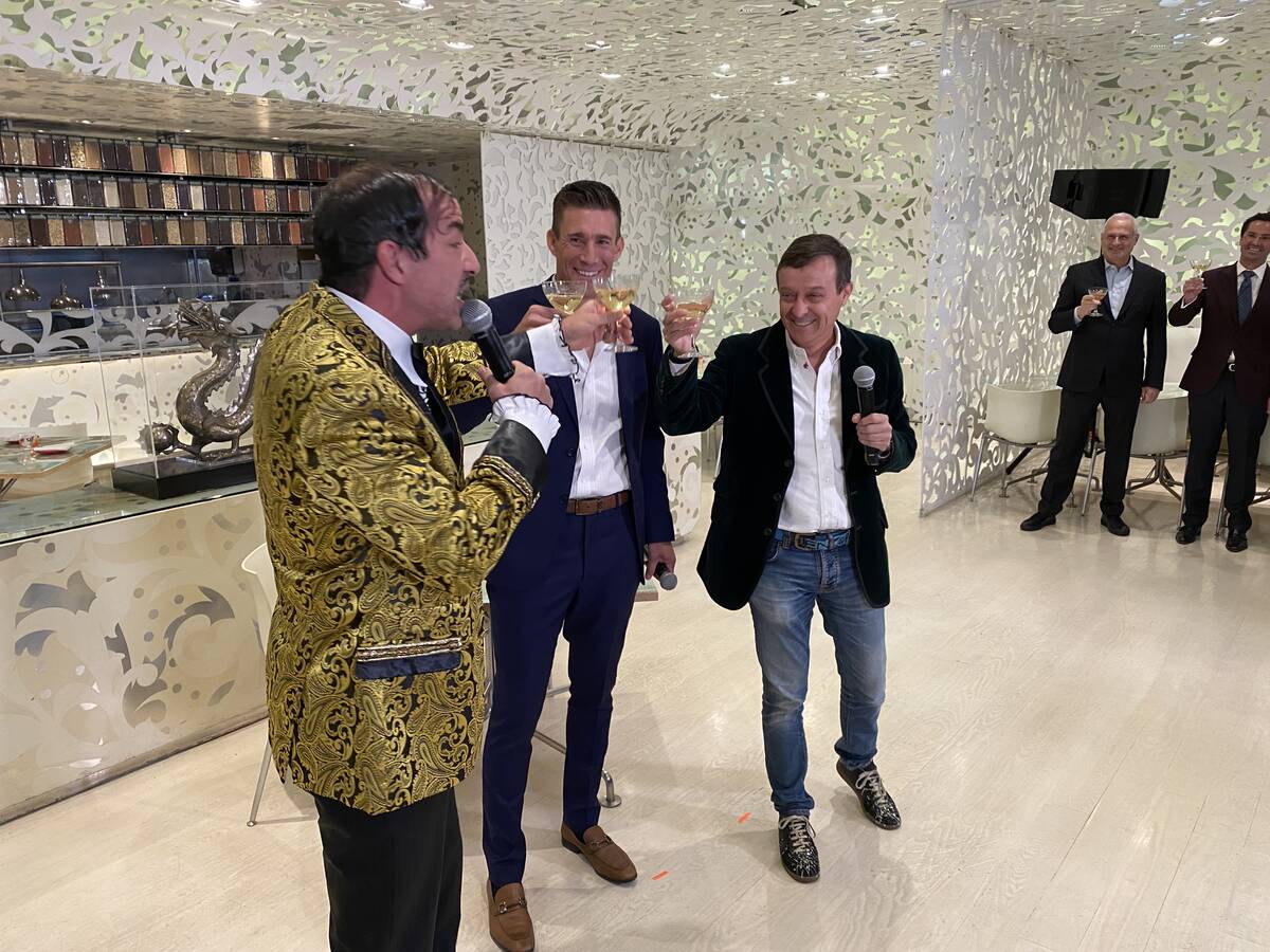 The Gazillionaire, left, Caesars Entertainment President and CEO Anthony Carano and Spiegelworl ...