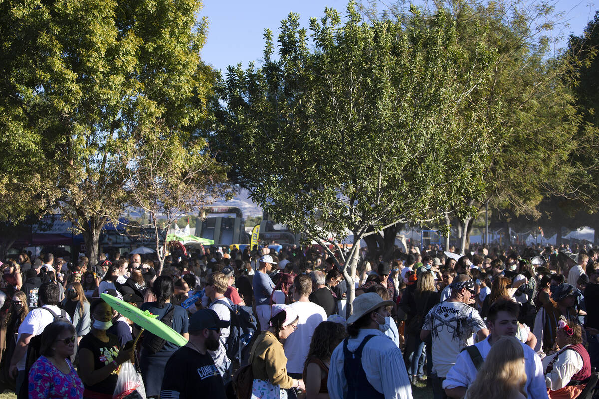 Crowds form as lines are long in the food tent area of the Age of Chivalry Renaissance Festival ...