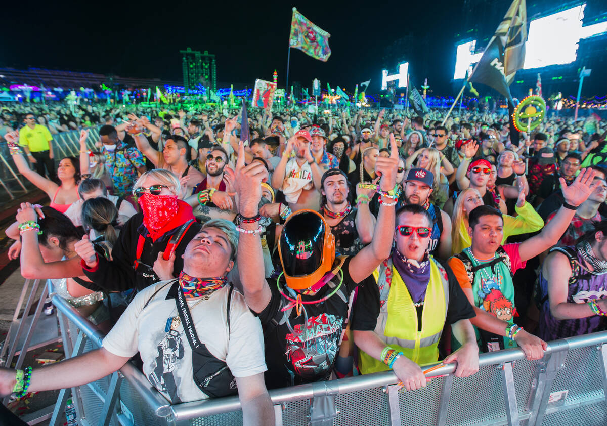 Concert goers dance at the Circuit Grounds stage during day two of Electric Daisy Carnival at L ...
