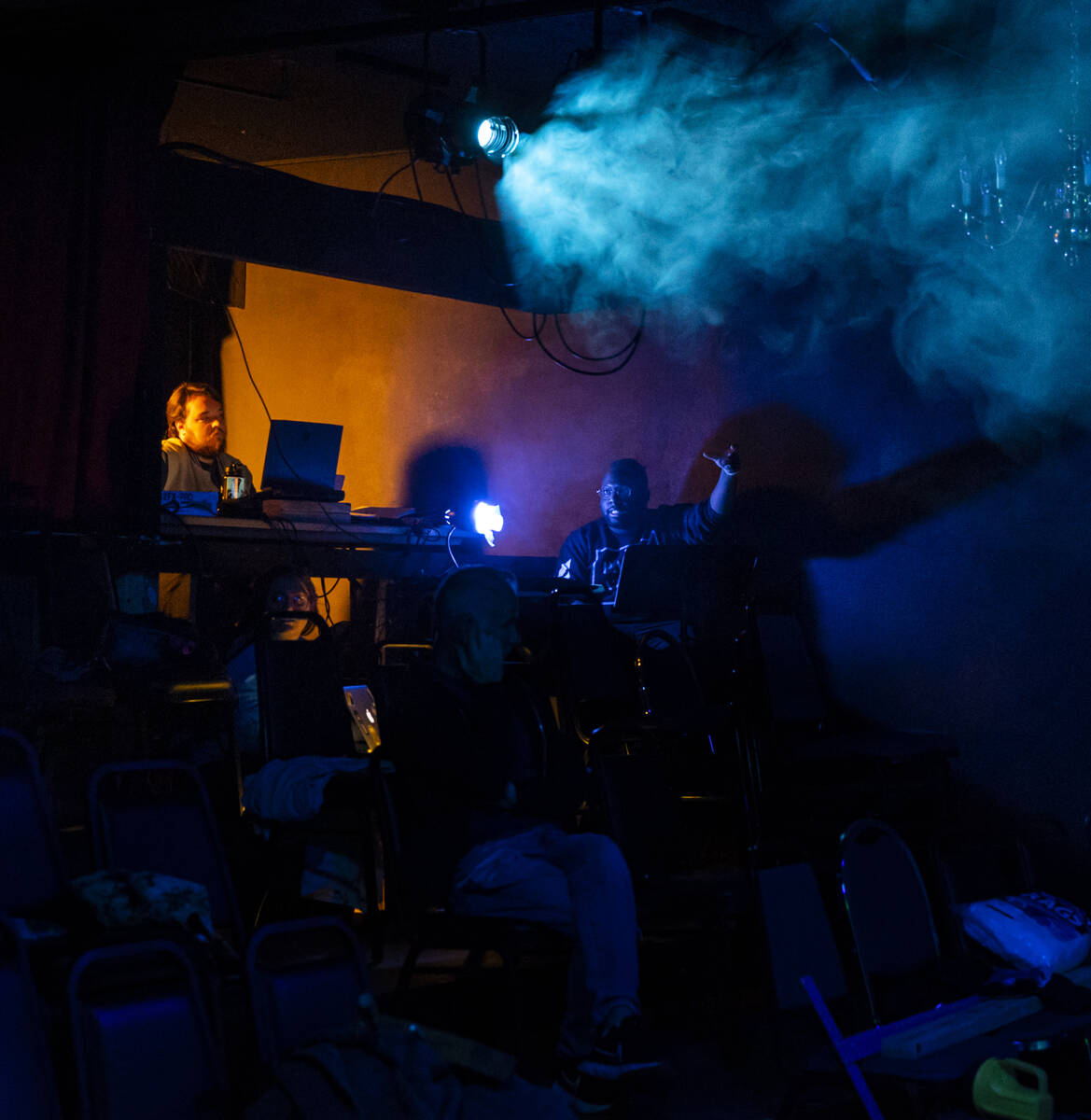 Lighting designer Marcus Randolph, right, speaks during a technical rehearsal for Ҕhe San ...