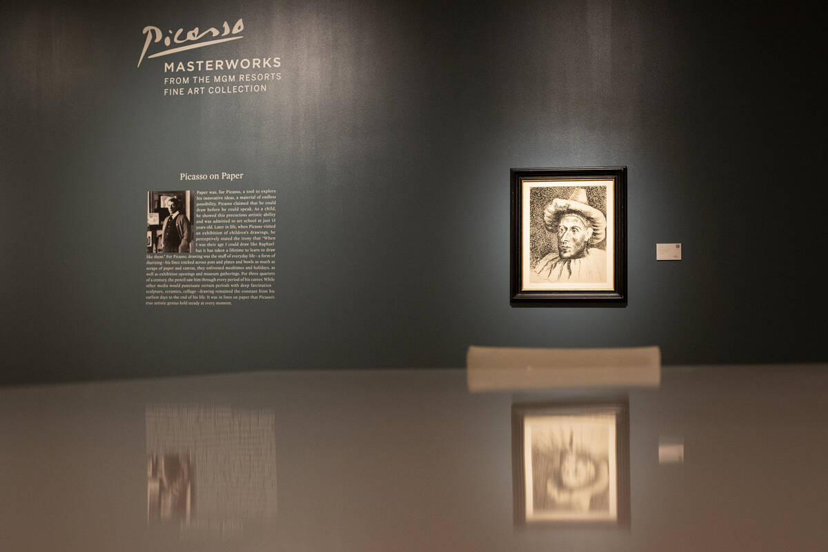 Pablo Picasso's "Pierrot," right, is on display at the Bellagio Gallery of Fine Art on Friday, ...
