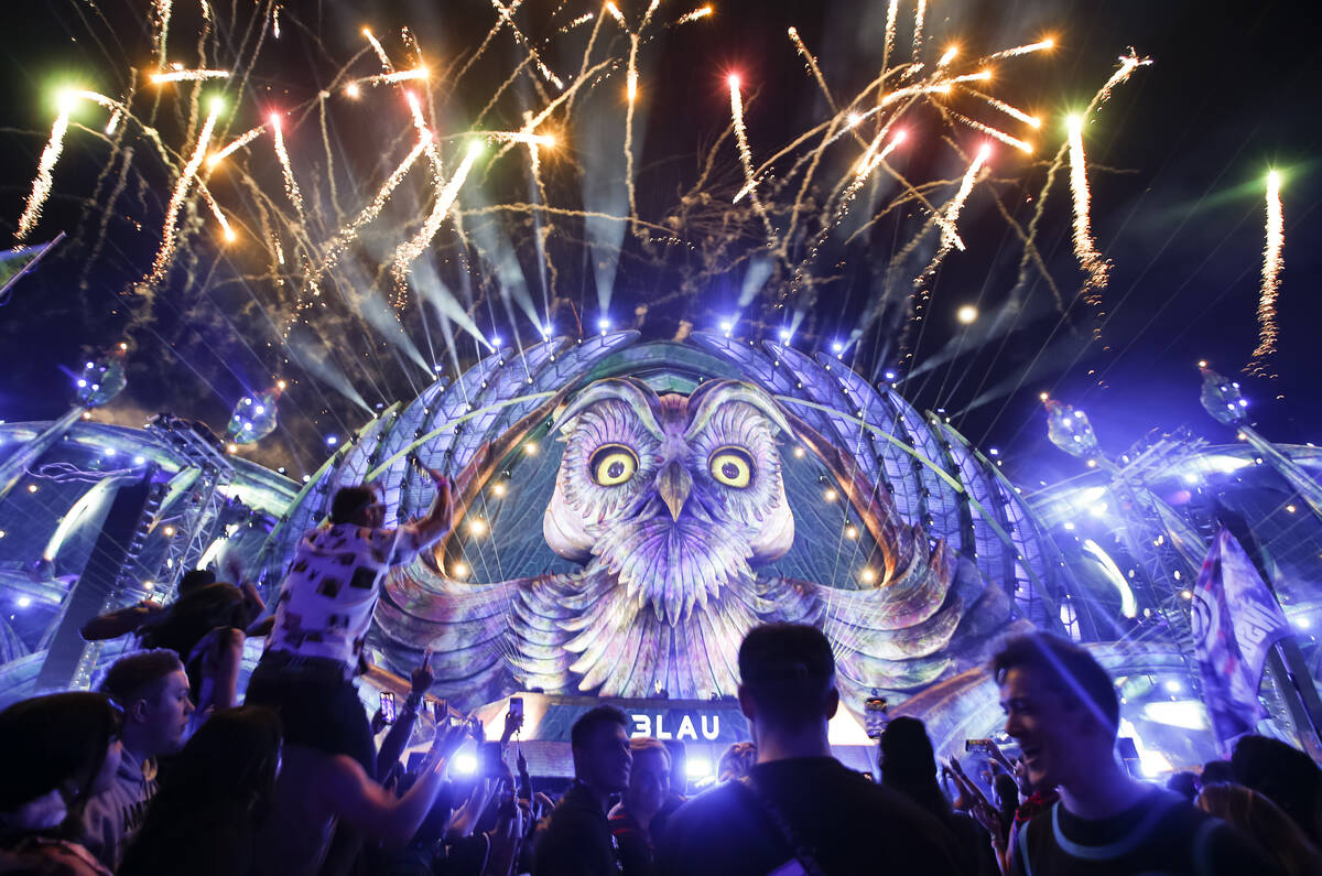Fireworks light up the stage as DJ 3Lau performs at the Kinetic Field stage during the final da ...