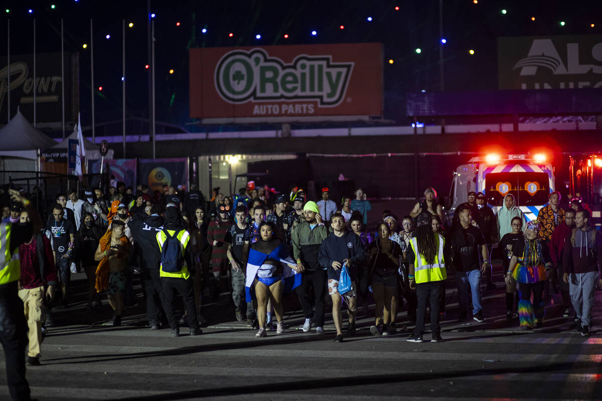 Attendees leave of the Electric Daisy Carnival at the Las Vegas Motor Speedway in the early hou ...