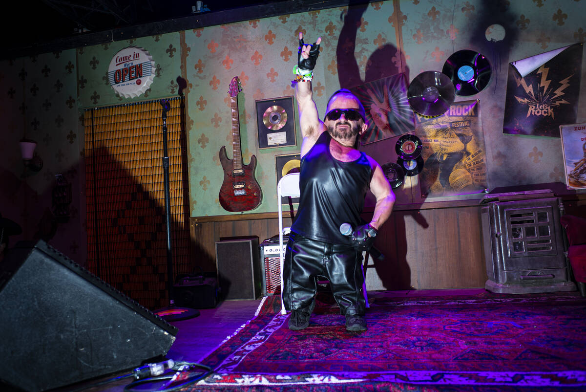 A performer at the Mini Bar entertains the crowd during the final day of the Electric Daisy Car ...