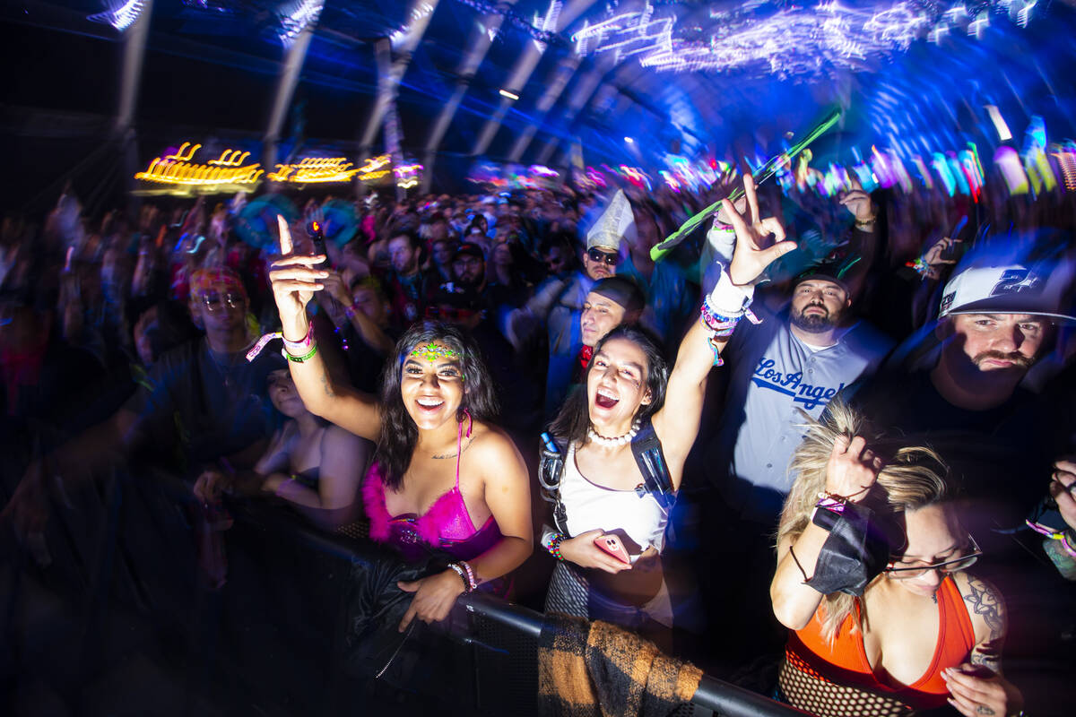 Attendees dance as Enrico Sangiuliano performs at the Neon Garden stage during the Electric Dai ...