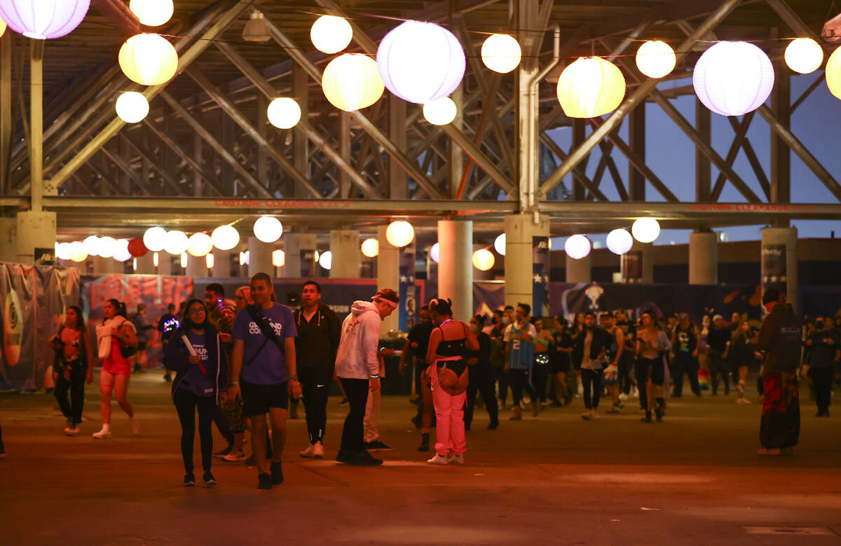 Attendees arrive for the second day of the Electric Daisy Carnival at the Las Vegas Motor Speed ...