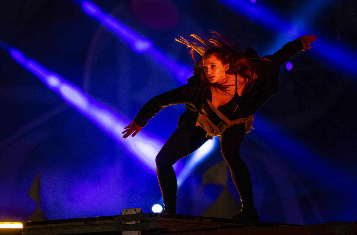 A performer in Nomads Land entertains the crowd during the second day of the Electric Daisy Car ...
