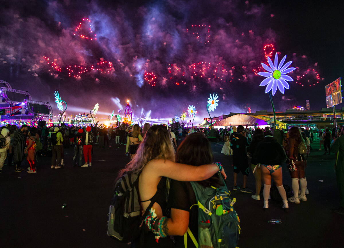 Attendees watch as fireworks go off across the festival grounds during the second day of the El ...
