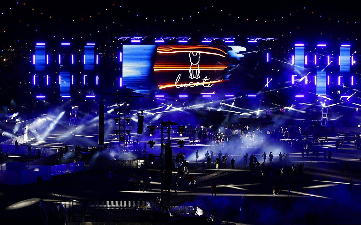 Attendees make their way to the Circuit Grounds stage during the first day of the Electric Dais ...