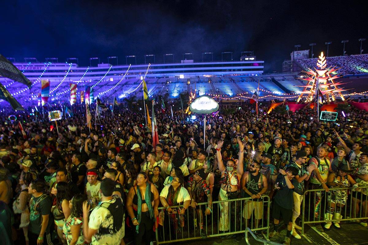 Attendees wait to enter the rest of the festival grounds for the first day of the Electric Dais ...