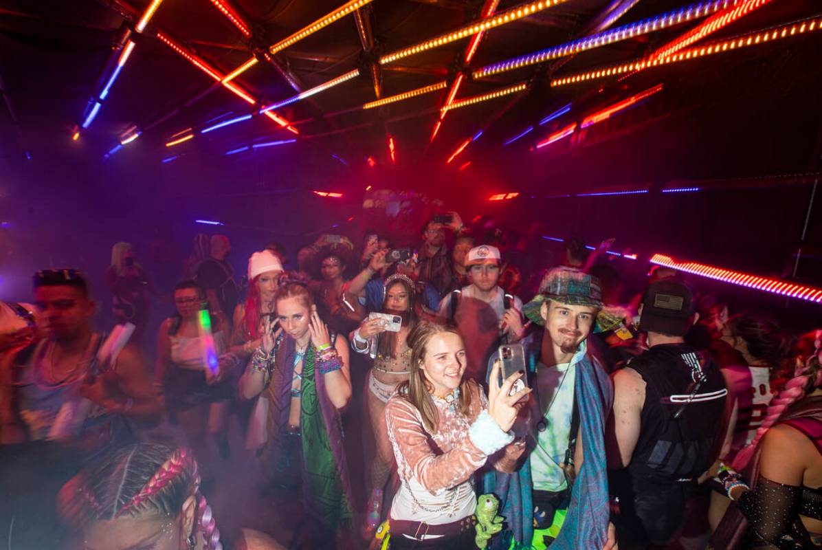 Attendees explore the Pixel Forest during the first day of the Electric Daisy Carnival at the L ...
