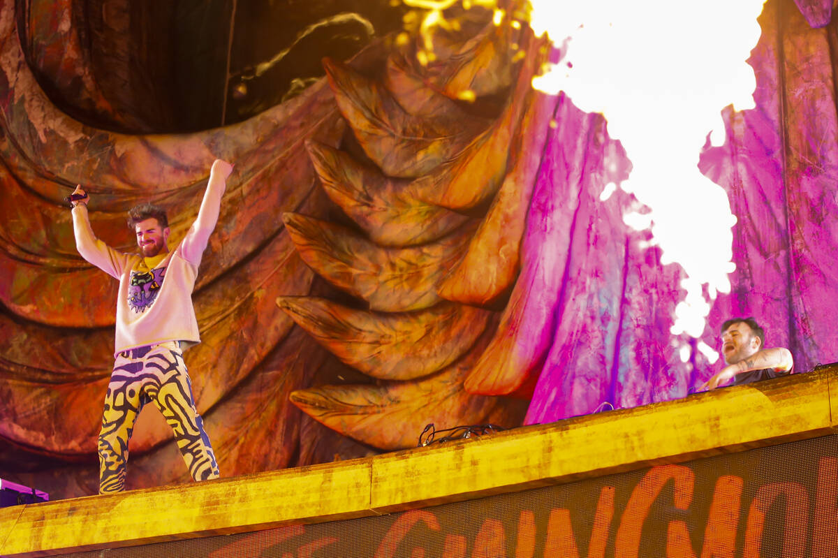 Andrew Taggert, left, and Alex Pall, of The Chainsmokers, perform at the Kinetic Field stage du ...
