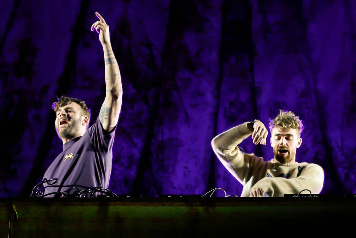 Andrew Taggert, right, and Alex Pall, of The Chainsmokers, perform at the Kinetic Field stage d ...