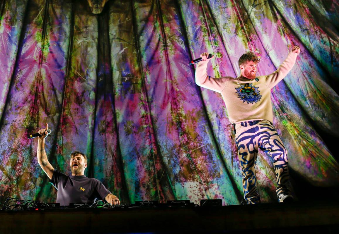 Andrew Taggert, right, and Alex Pall, of The Chainsmokers, perform at the Kinetic Field stage d ...