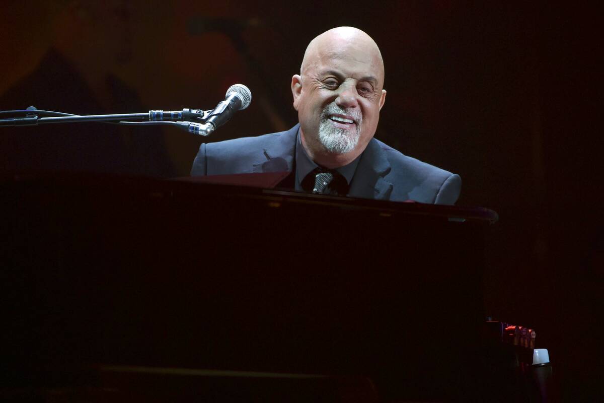 Musician Billy Joel performs during his 100th lifetime performance at Madison Square Garden on ...