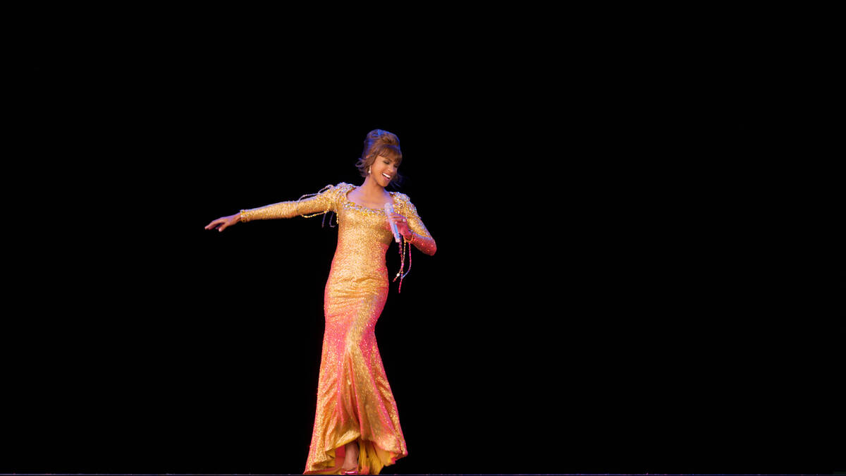 A scene from "An Evening With Whitney: The Whitney Houston Hologram Concert" is shown in this u ...