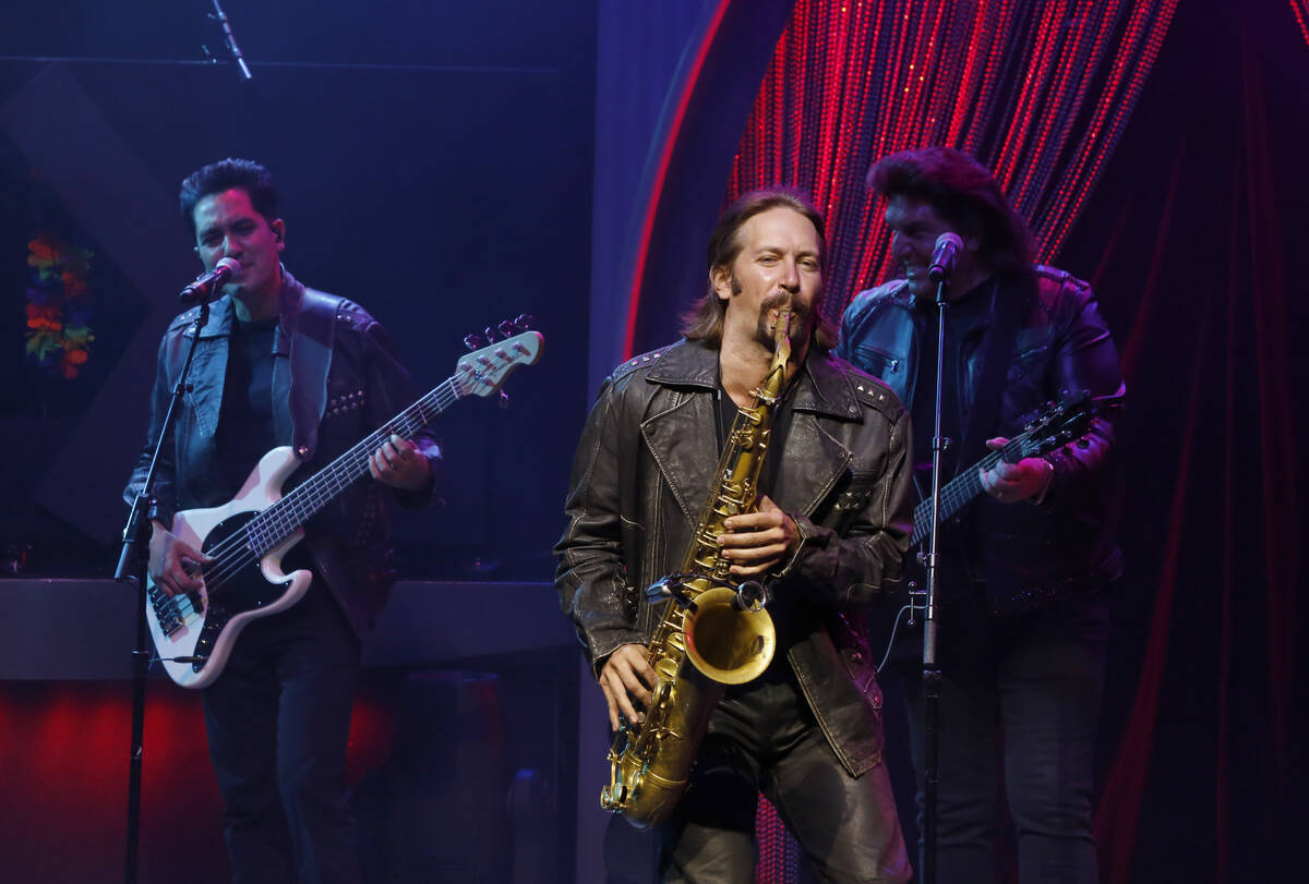 (L-R) Bassist Fernando Tort, saxophonist Joe Bari and singer Vinny Adinolfi Jr., of The Bronx W ...