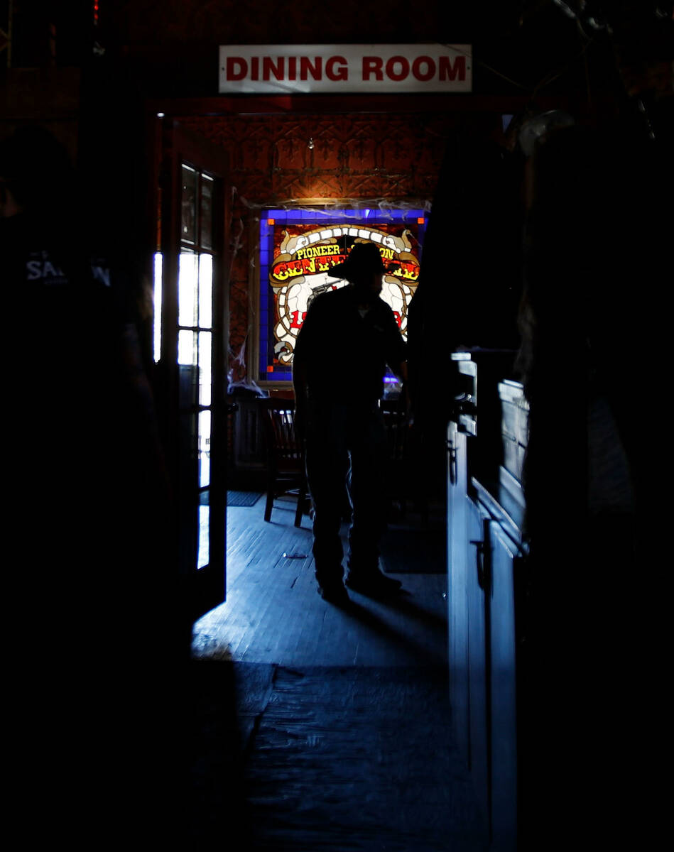 A dining room sign is seen at the Pioneer Saloon, Thursday, Oct. 28, 2021, in Goodsprings, Nev. ...