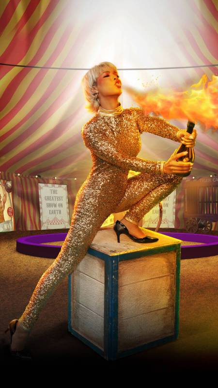The Firebreather character is shown from "The Greatest Show On Earth" performing at Marquee Sun ...