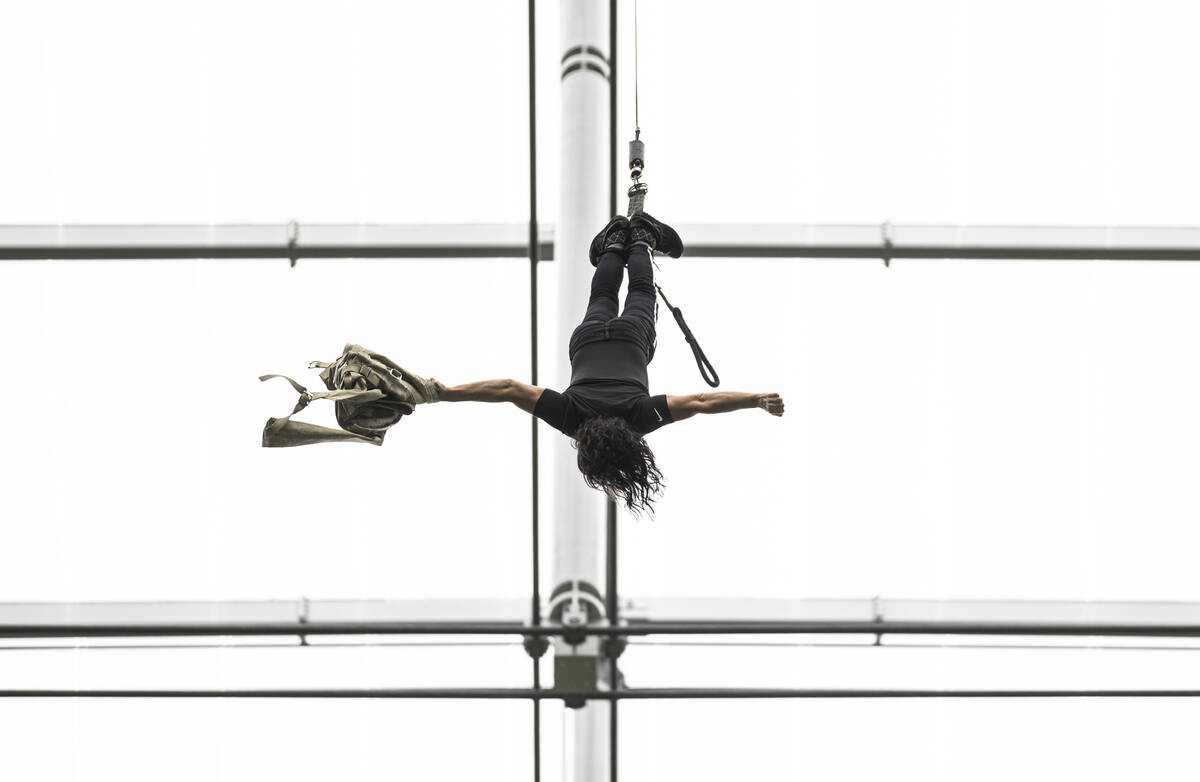 Criss Angel performs before the start of an NFL football game between the Raiders and the Chica ...