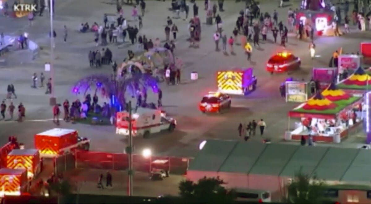 Emergency personnel respond to the Astroworld music festival in Houston on Friday, Nov. 5, 2021 ...