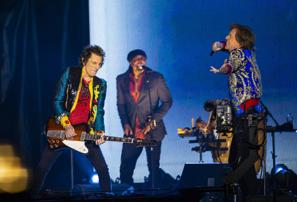 Ronnie Wood, left, and Mick Jagger of The Rolling Stones perform at Allegiant Stadium in Las Ve ...