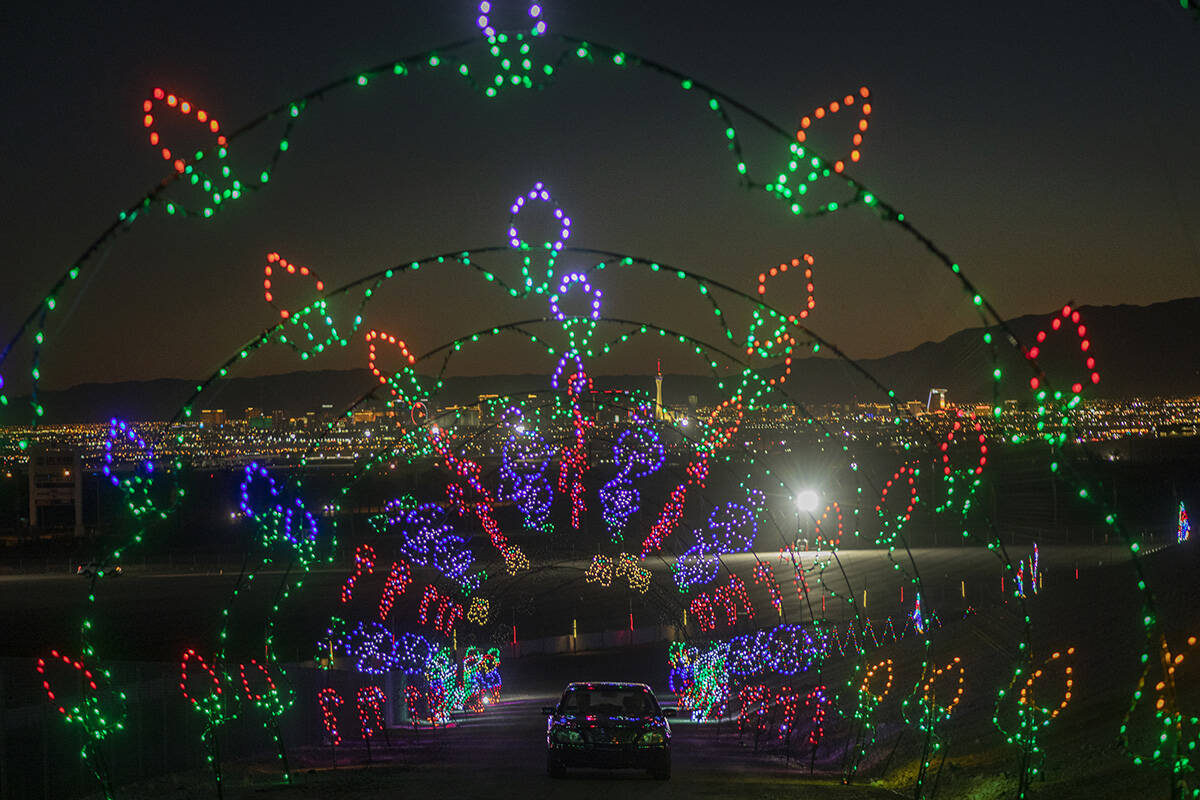 Cars tour through Glittering Lights at Las Vegas Motor Speedway in Las Vegas on Monday Nov. 30, ...